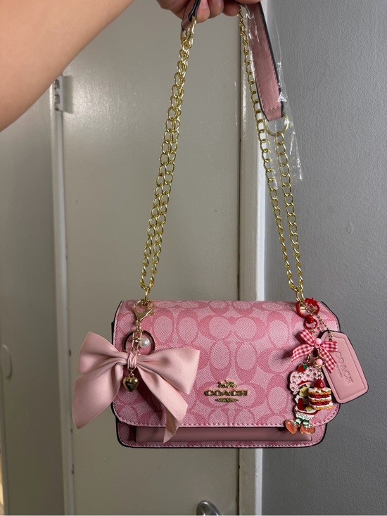 Coach Handbags - Coach Pink Signature Bow Chain Crossbody Bag